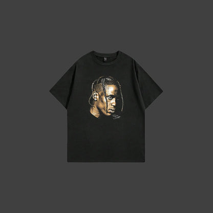 Black t-shirt with a graphic of a person's face on a white background